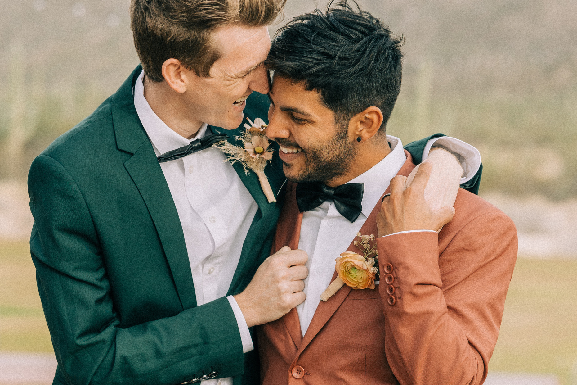 Newlywed Couple Wrapping Their Arms Around Each Other